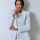 Elegant white women's blazer and pants suit