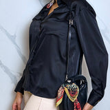 Faux leather shorts by Artigli