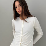 Cream round-neck cardigan with buttons