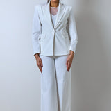 Elegant white women's blazer and pants suit