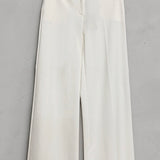 Elegant white women's blazer and pants suit