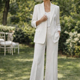 Elegant white women's blazer and pants suit