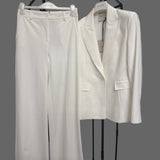 Elegant white women's blazer and pants suit